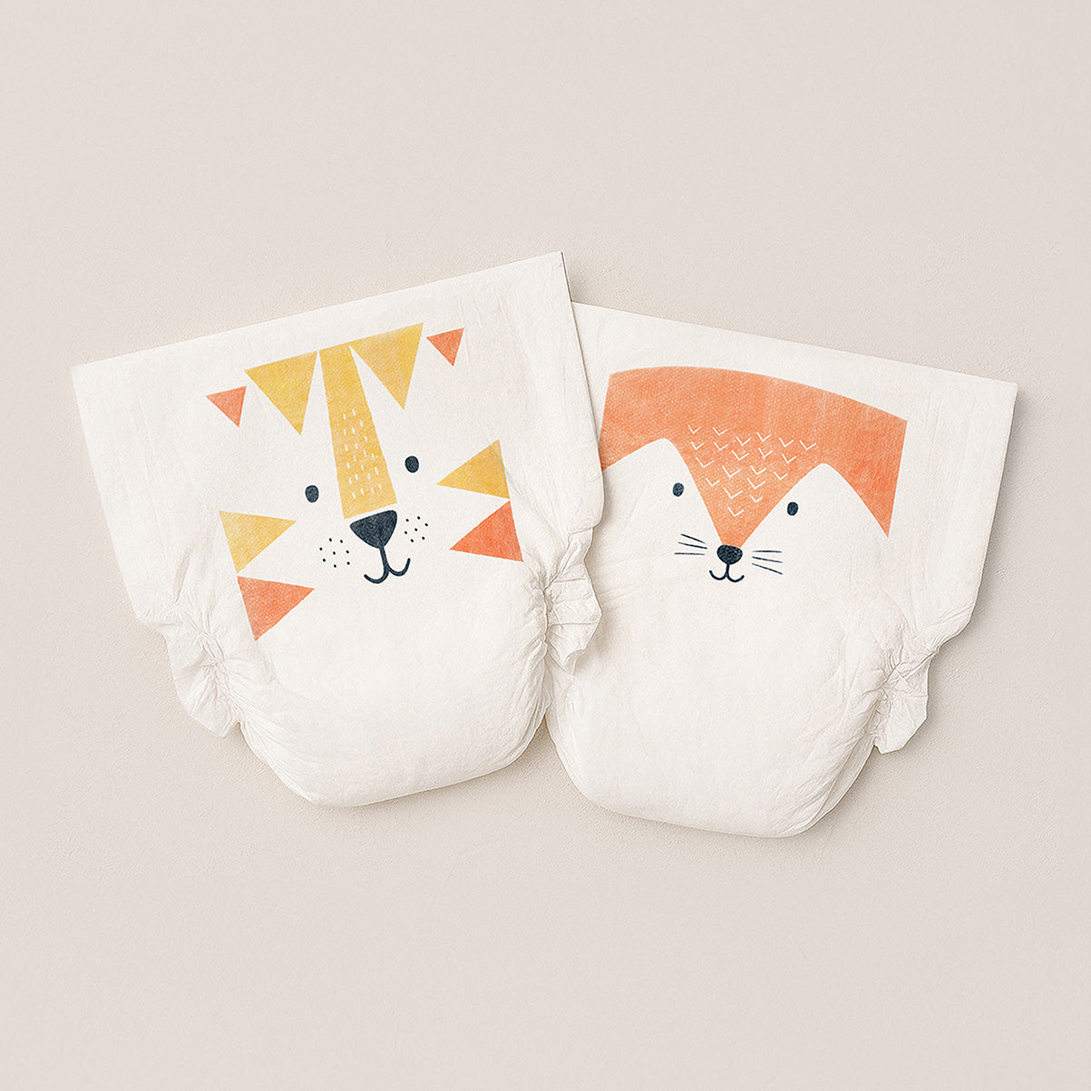 Two Kit and Kin nappies with animal prints